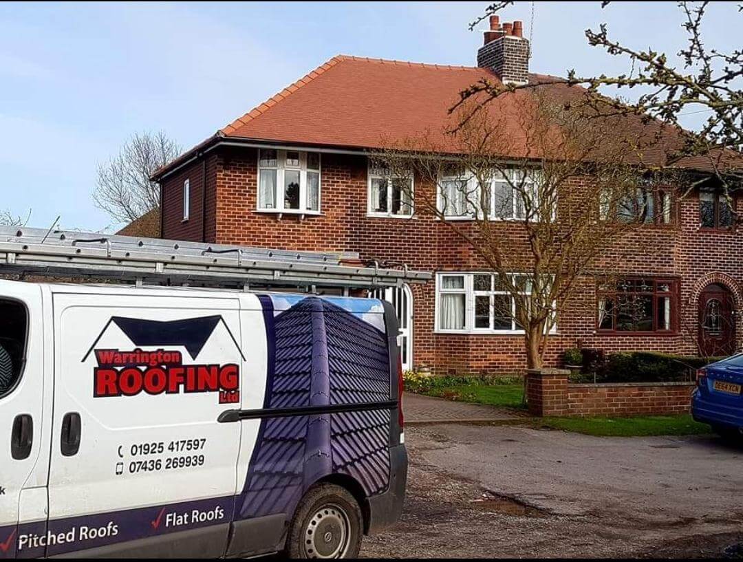 Warrington Roofing Ltd van at a completed project